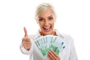 happy young woman holding euro bills